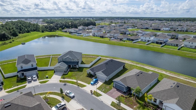 drone / aerial view with a water view