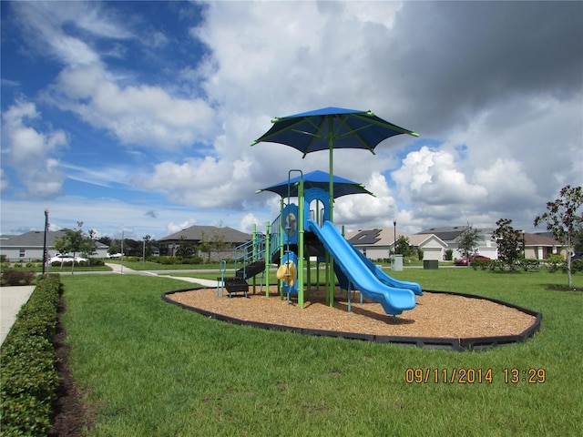 view of jungle gym with a yard