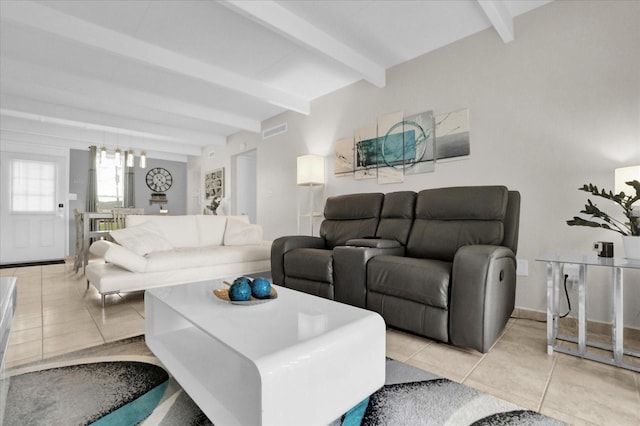 tiled living room featuring beamed ceiling