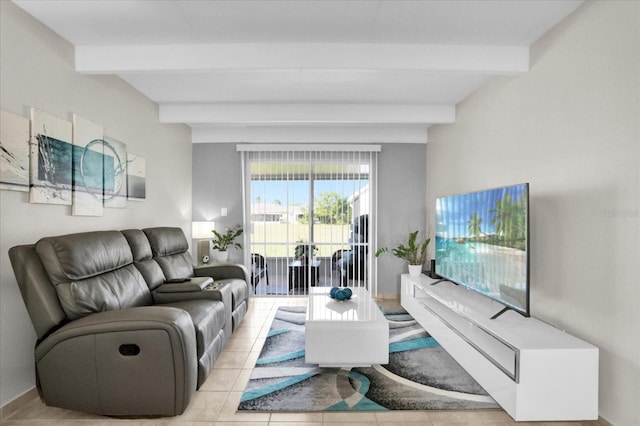 living room with beamed ceiling and light tile patterned floors