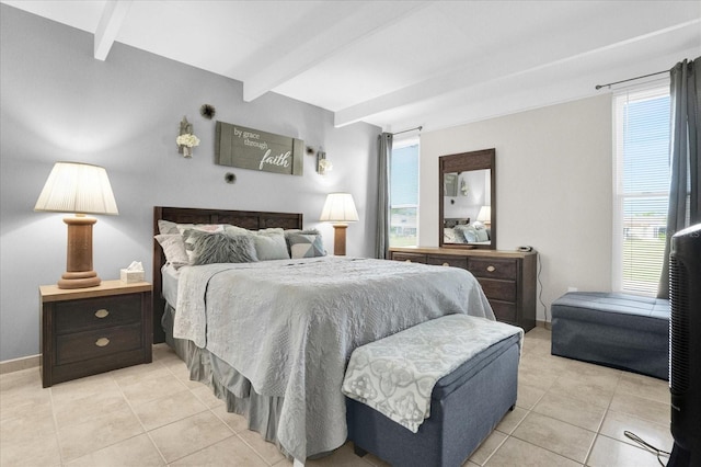 bedroom with light tile patterned flooring and beamed ceiling