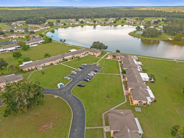 drone / aerial view with a water view