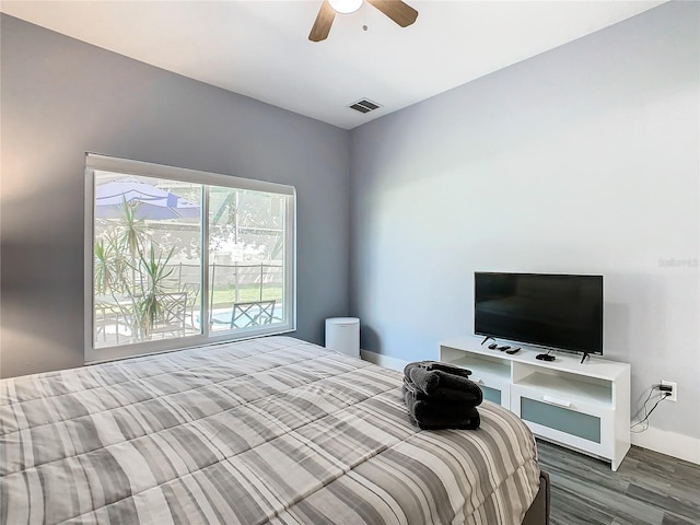 bedroom featuring wood-type flooring and ceiling fan