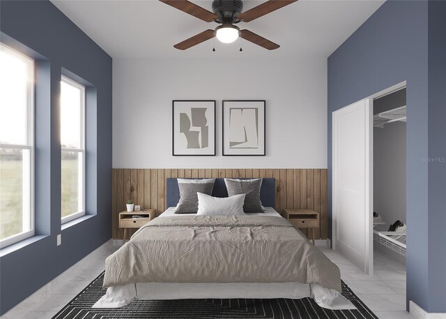 bedroom with wood walls and ceiling fan