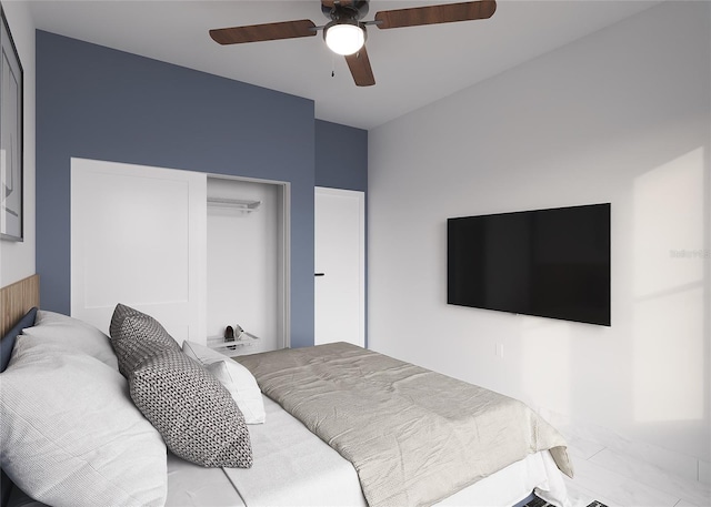 bedroom featuring ceiling fan and a closet