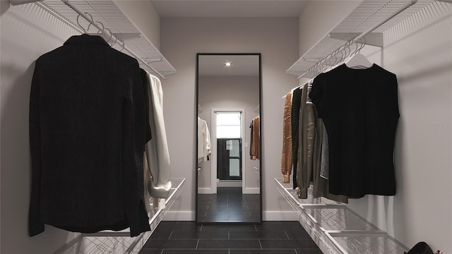 mudroom featuring dark tile patterned flooring