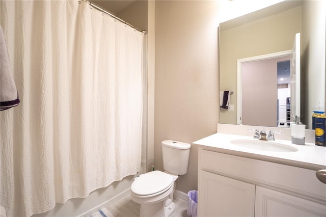 full bathroom featuring vanity, toilet, and shower / bath combo with shower curtain