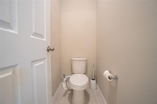 bathroom featuring toilet