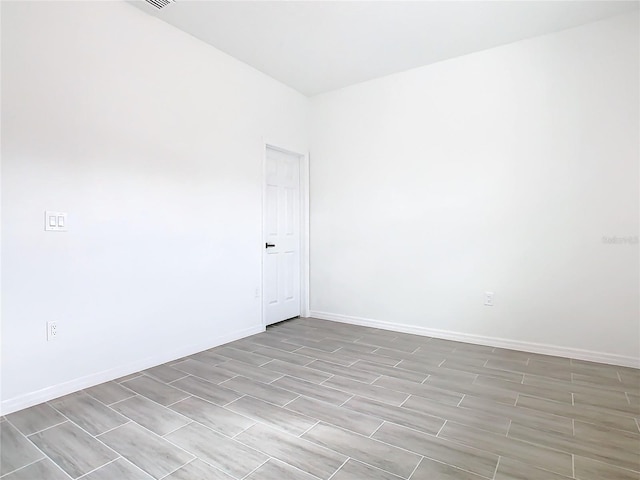 unfurnished room featuring light wood-type flooring