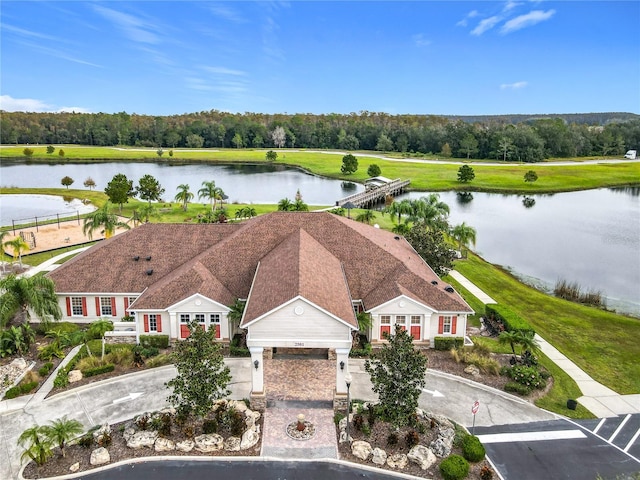 drone / aerial view with a water view