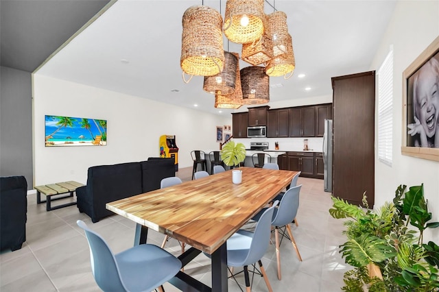 dining space with light tile patterned floors