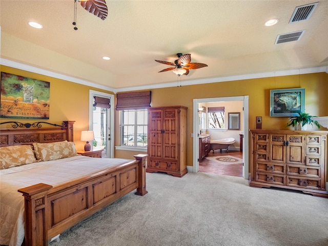 bedroom featuring light carpet, multiple windows, and visible vents