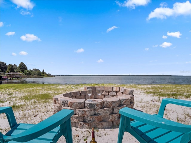 water view with a fire pit