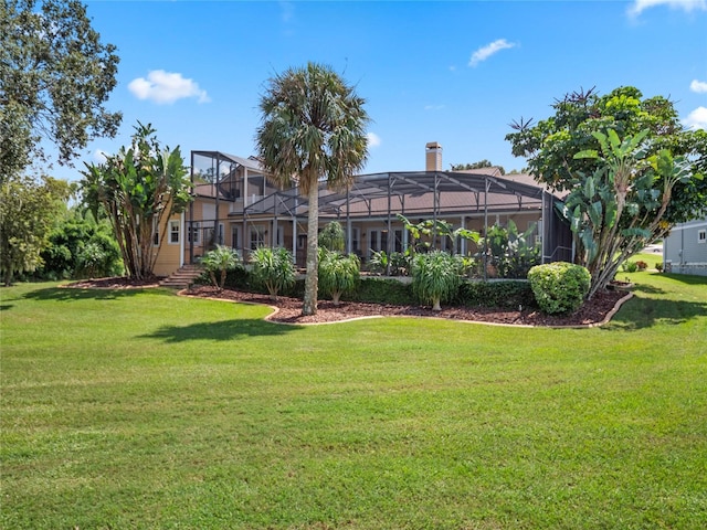 view of yard featuring a lanai