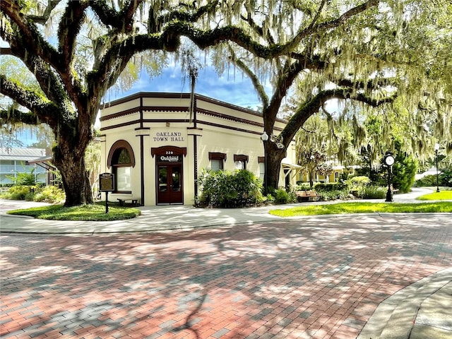 view of front of house featuring stucco siding