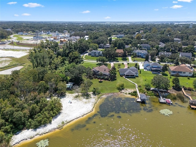 bird's eye view with a water view and a residential view