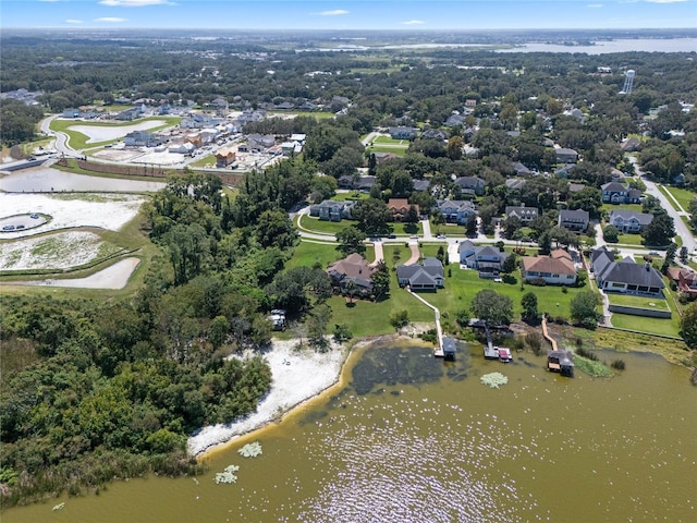 bird's eye view with a water view and a residential view