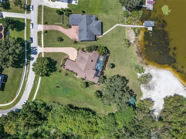 birds eye view of property featuring a water view