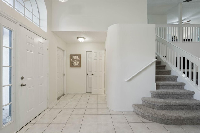 view of tiled foyer entrance