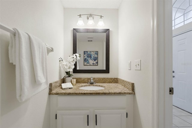 bathroom featuring vanity and tile patterned floors