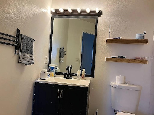 1909 Summer Club Dr Unit 307, Oviedo, FL 32765 - half bathroom with toilet and vanity