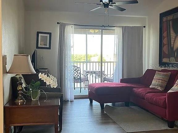 1909 Summer Club Dr Unit 307, Oviedo, FL 32765 - interior space with wood finished floors and a ceiling fan