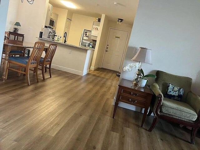 1909 Summer Club Dr Unit 307, Oviedo, FL 32765 - interior space with baseboards and wood finished floors