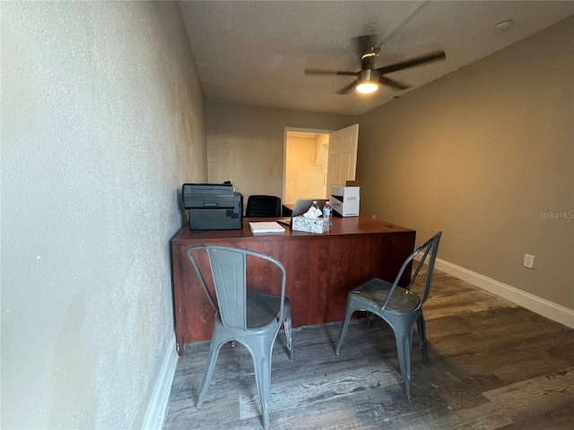 office area featuring ceiling fan and dark hardwood / wood-style flooring