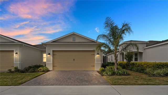 view of front of home with a garage