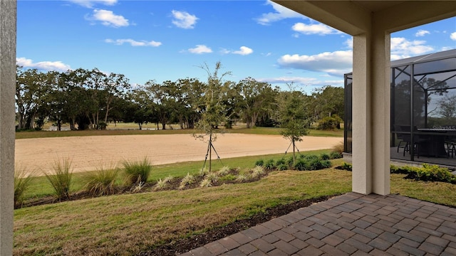 view of yard with a lanai