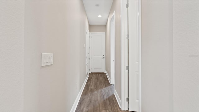 hall featuring wood-type flooring