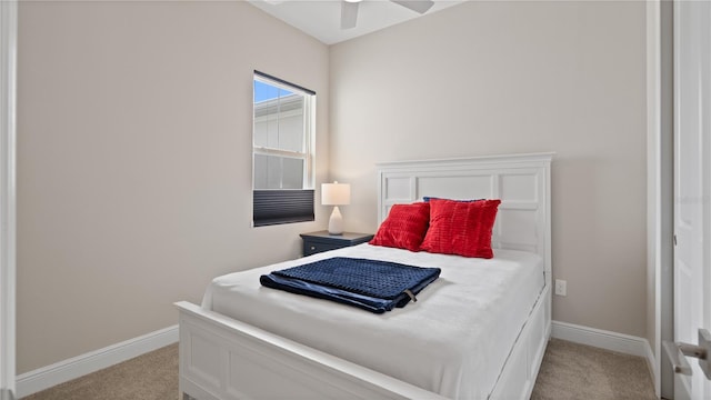 bedroom featuring ceiling fan and light colored carpet