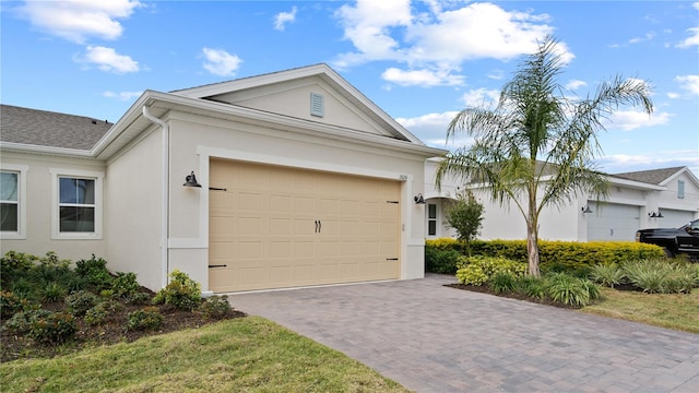 ranch-style home with a garage