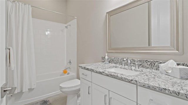 full bathroom with vanity, shower / bath combination with curtain, and toilet