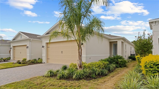 view of side of home featuring a garage