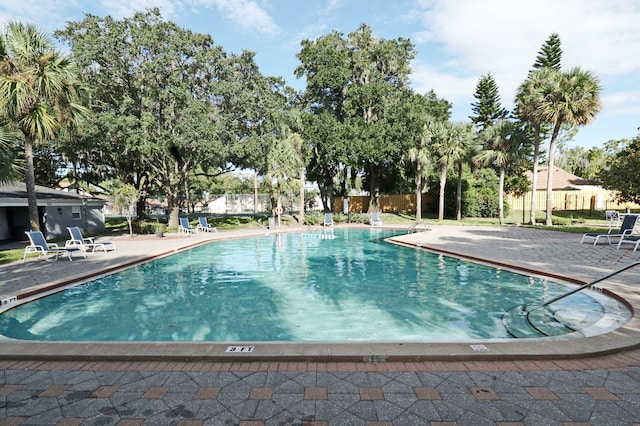 view of swimming pool featuring a patio