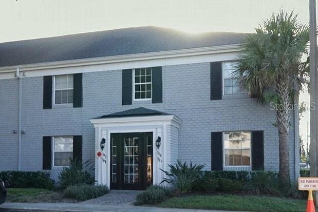 view of front facade with brick siding