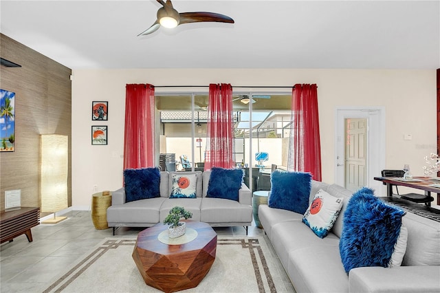 living room with light tile patterned floors and ceiling fan