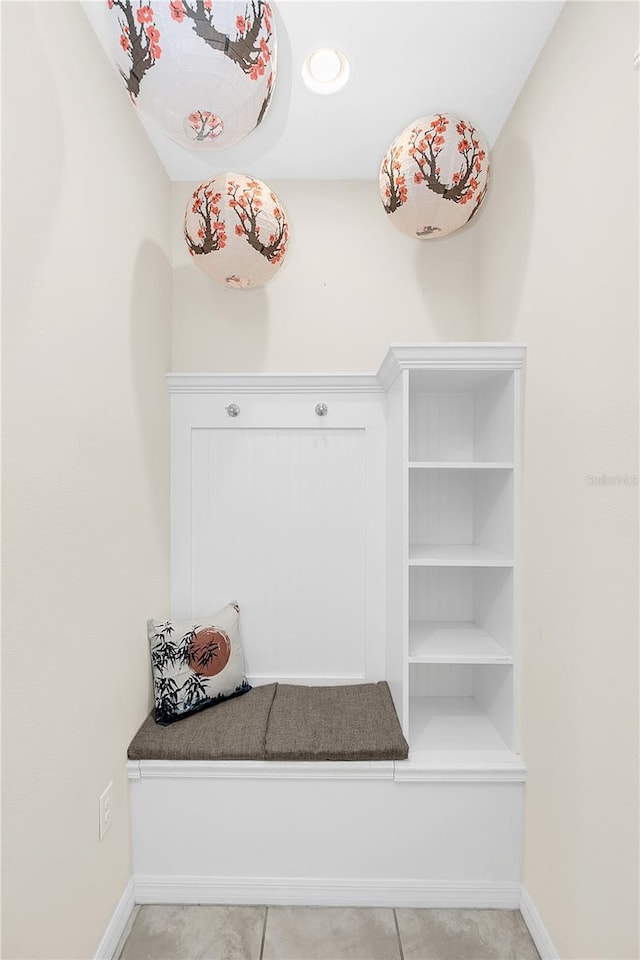 mudroom featuring light tile patterned flooring