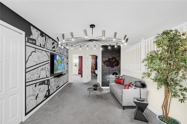 living room featuring carpet floors and a chandelier