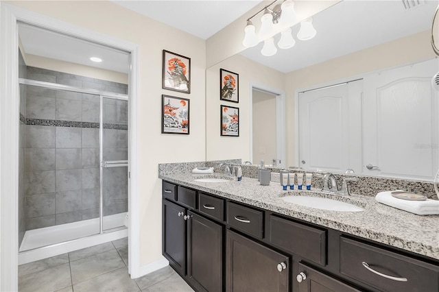 bathroom featuring walk in shower, vanity, toilet, and tile patterned floors