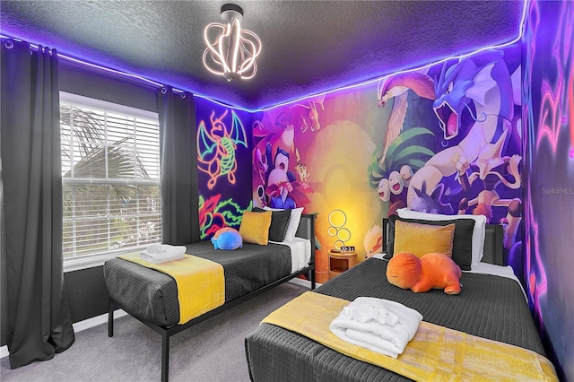 bedroom with a textured ceiling, carpet, and an inviting chandelier