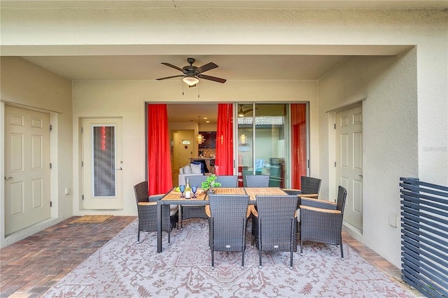 view of patio featuring ceiling fan