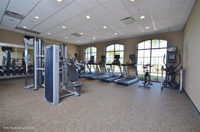 workout area featuring a drop ceiling