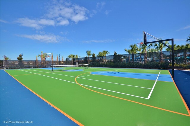 view of basketball court featuring tennis court