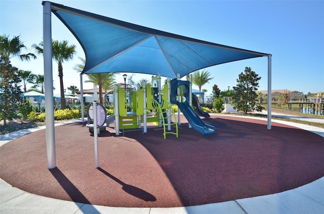 view of playground featuring a water view