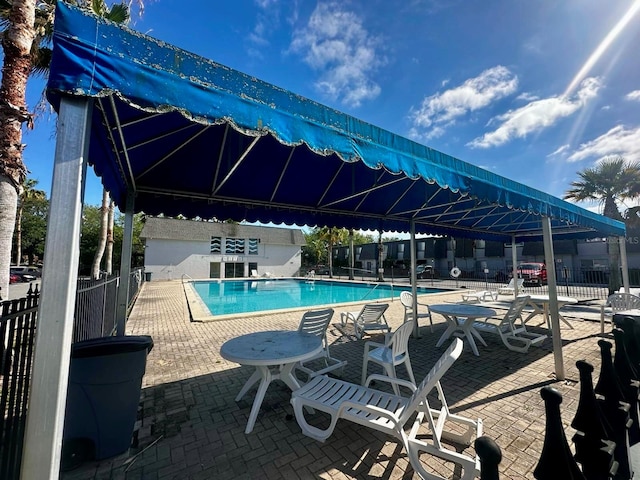 view of pool with a patio