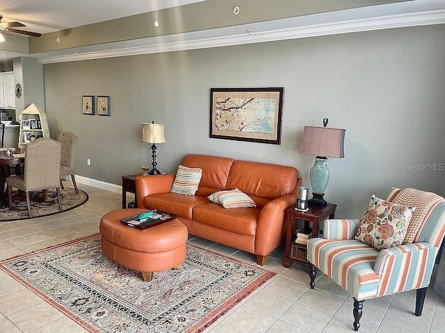 living room featuring ceiling fan, light tile patterned flooring, and crown molding