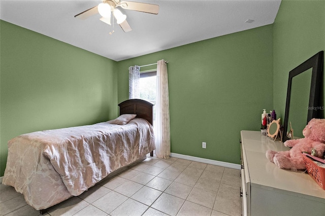 bedroom featuring ceiling fan and light tile patterned floors