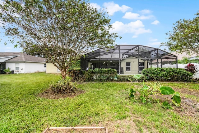 view of yard with a lanai